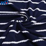 Tessuto jacquard e tweed tinto filo per abbigliamento