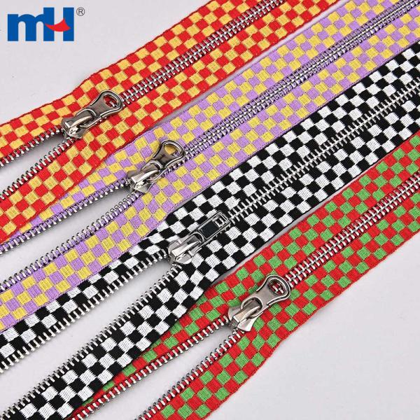 #5 Brass zipper with embossed ribbon
