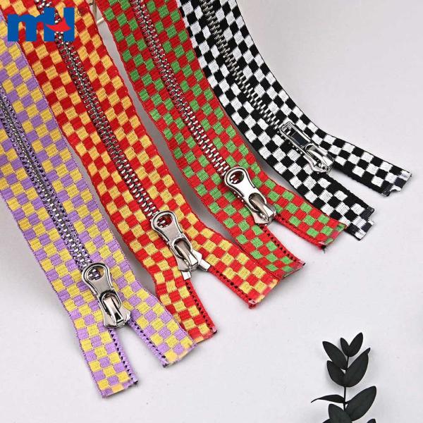 #5 Brass zipper with embossed ribbon
