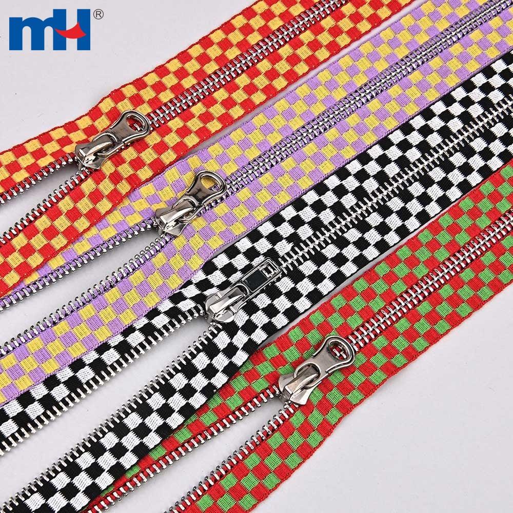 #5 Brass zipper with embossed ribbon
