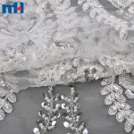 Tissu en dentelle de mariée avec perles