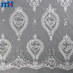 Tissu en dentelle de mariée avec perles