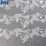 Tissu en dentelle de mariée avec perles