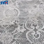 Tissu en dentelle de mariée avec perles