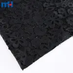 Broderie sur tissu par découpe laser