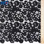 Broderie sur tissu par découpe laser