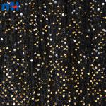 Tissu brodé de paillettes