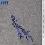 Tecido de lã bordado com flores