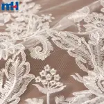 Tecido de renda bordado em corda