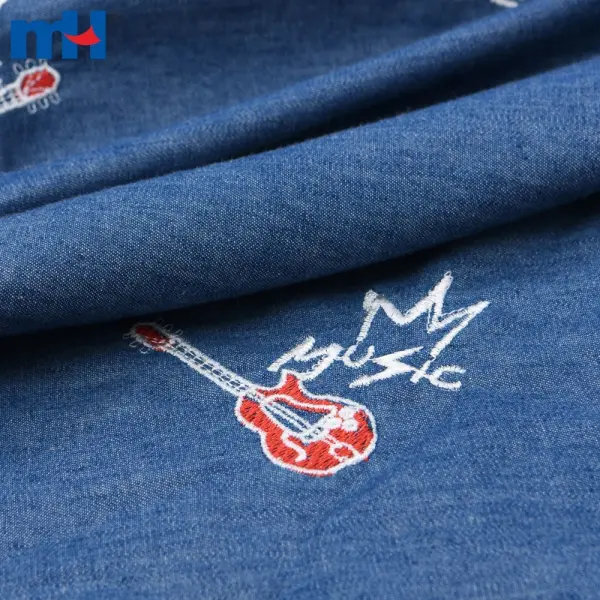 Gitar işlemeli denim kumaş