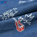 Gitar işlemeli denim kumaş