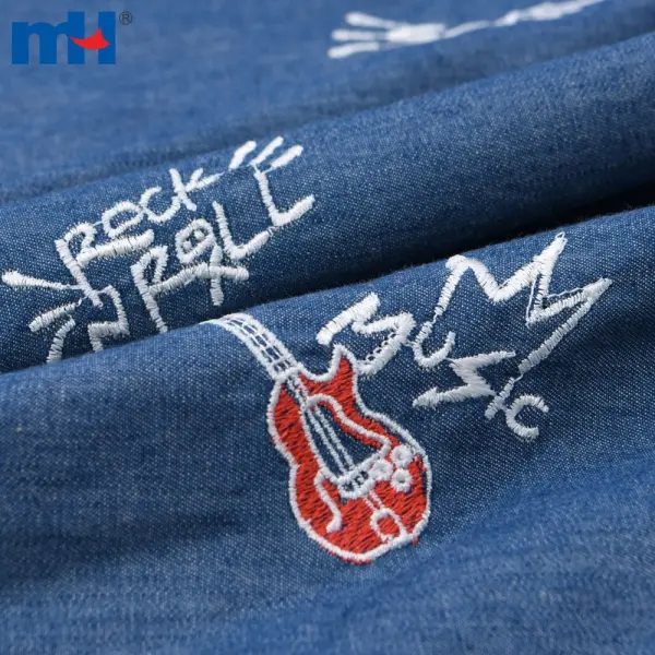Gitar işlemeli denim kumaş