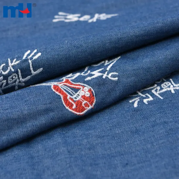 Gitar işlemeli denim kumaş