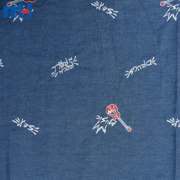 Gitar işlemeli denim kumaş