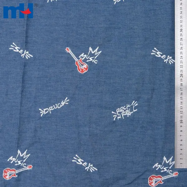 Gitar işlemeli denim kumaş