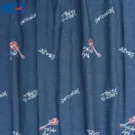 Gitar işlemeli denim kumaş