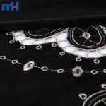Embroidery on fabric by laser cutting