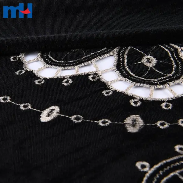 Embroidery on fabric by laser cutting