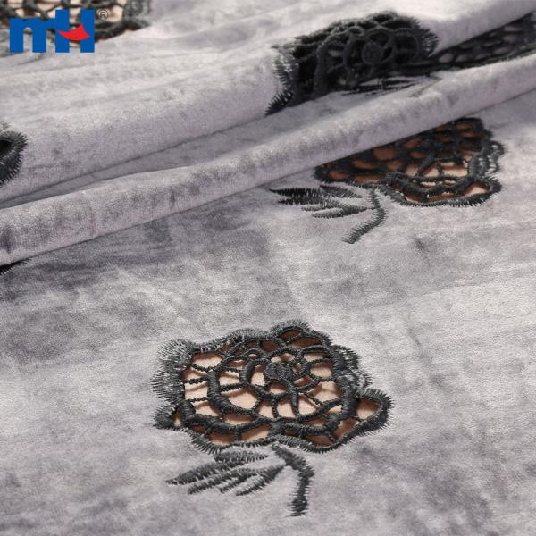 Embroidery on fabric by laser cutting