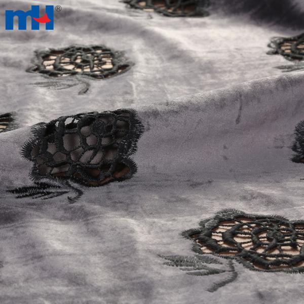 Embroidery on fabric by laser cutting