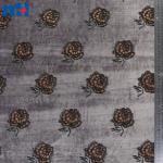 Embroidery on fabric by laser cutting
