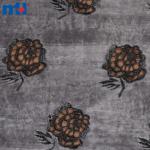 Embroidery on fabric by laser cutting