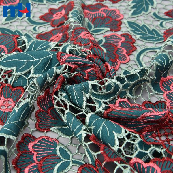 Tissu en dentelle découpé au laser avec un motif de feuilles vertes