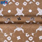 Broderie sur tissu par découpe laser