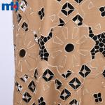 Broderie sur tissu par découpe laser
