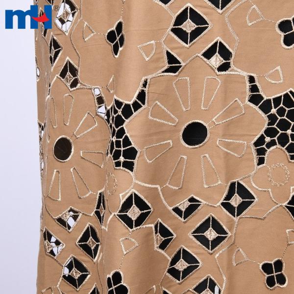 Broderie sur tissu par découpe laser