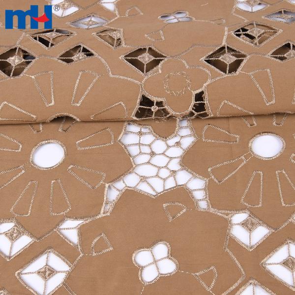 Broderie sur tissu par découpe laser