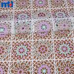 Tissu dentelle arc-en-ciel