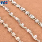 Catena a coppe di perle e cristalli