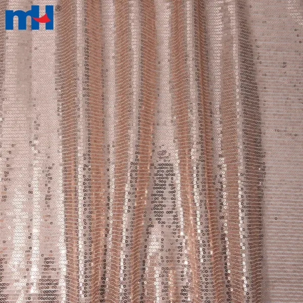 Tissu en maille à paillettes or rose