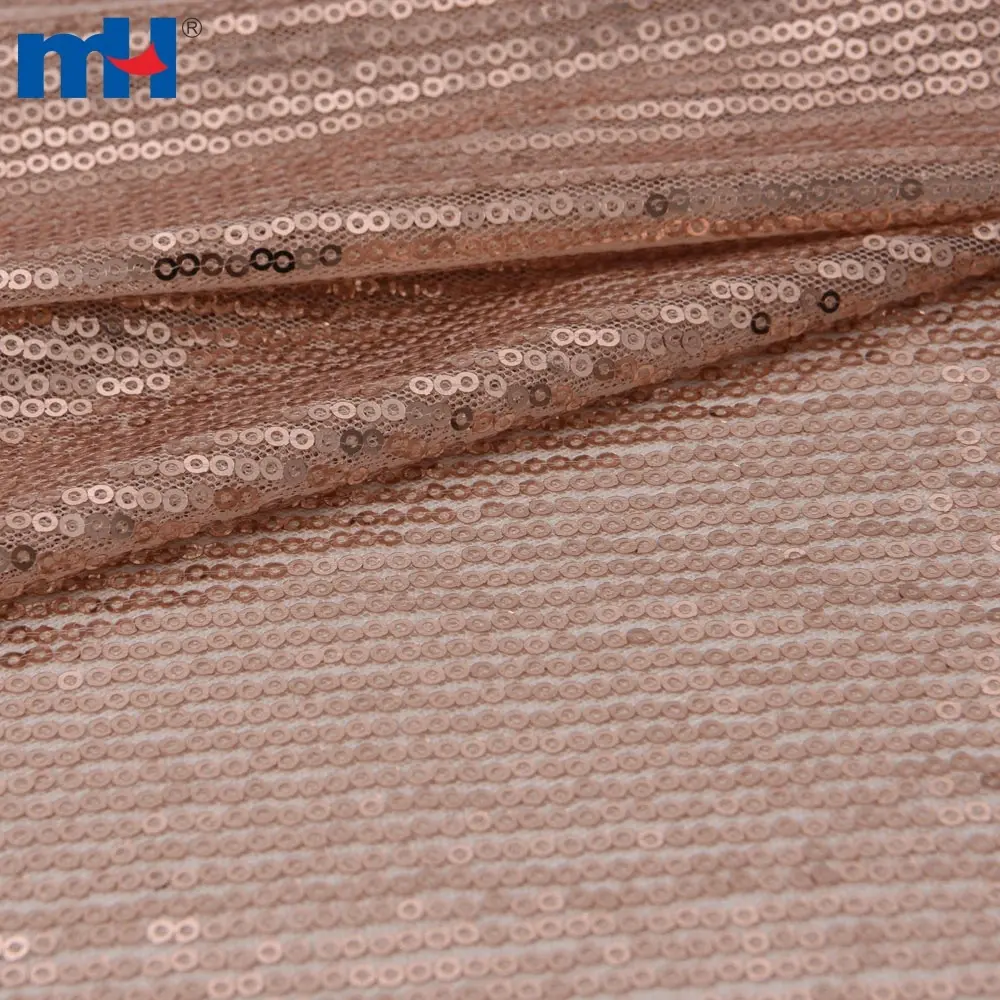 Tissu en maille à paillettes or rose