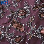 Broderie de paillettes et de dentelle
