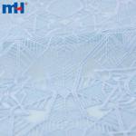 Geometrically embroidered organza fabric