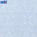 Geometrically embroidered organza fabric