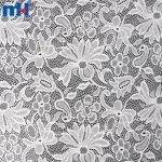 Tissu en dentelle tricoté français
