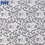 Tissu en dentelle tricoté français
