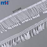 Bordure en dentelle avec pompon