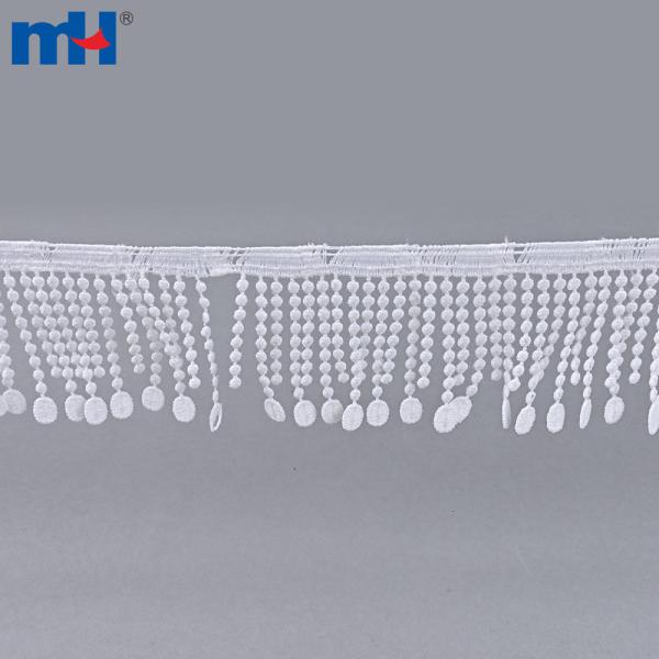 Bordure en dentelle avec pompon