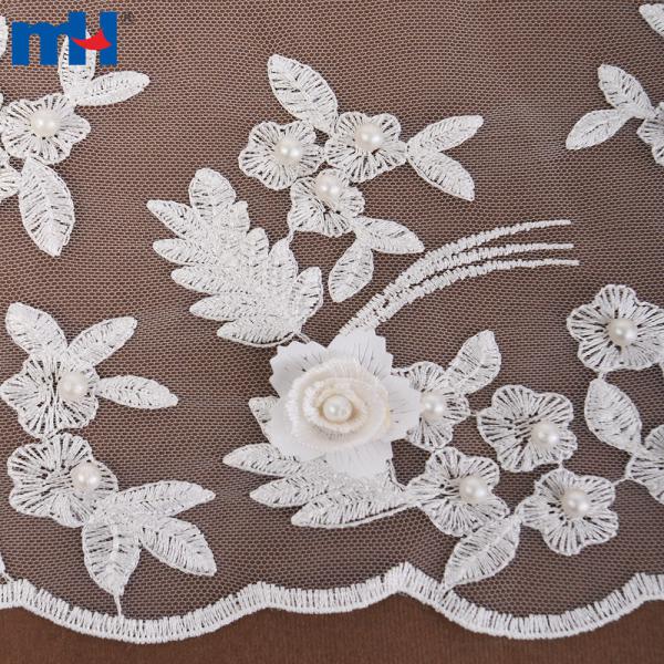 Diseñar un vestido de novia hecho de encaje y abalorios