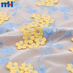 Embroidered mesh fabric