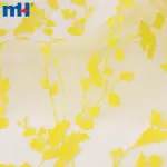 Yellow embroidered organza fabric