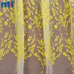 Yellow embroidered organza fabric
