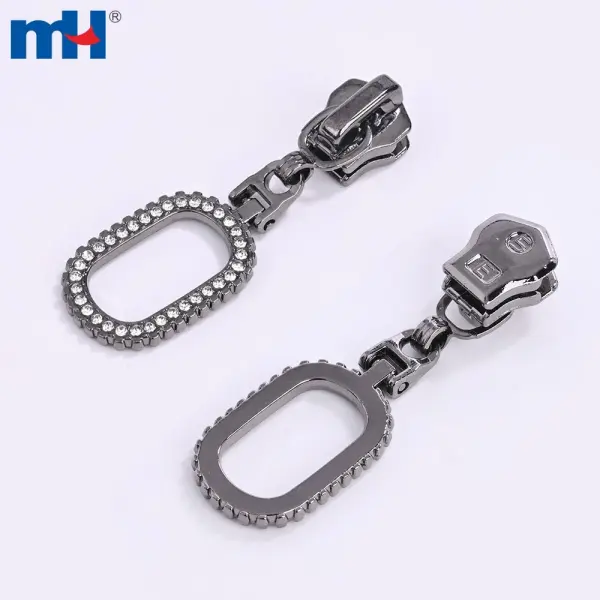 5.9 grams of zinc alloy with rhinestone-embellished puller