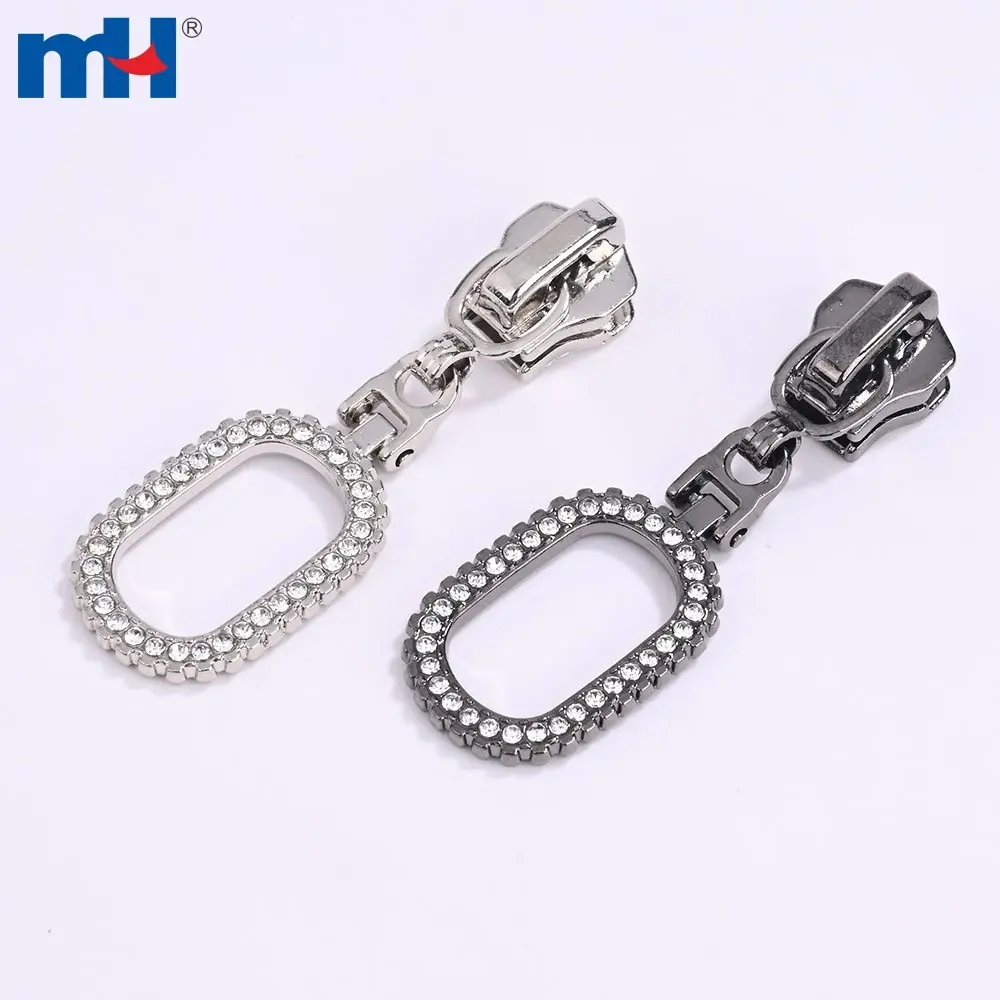5.9 grams of zinc alloy with rhinestone-embellished puller